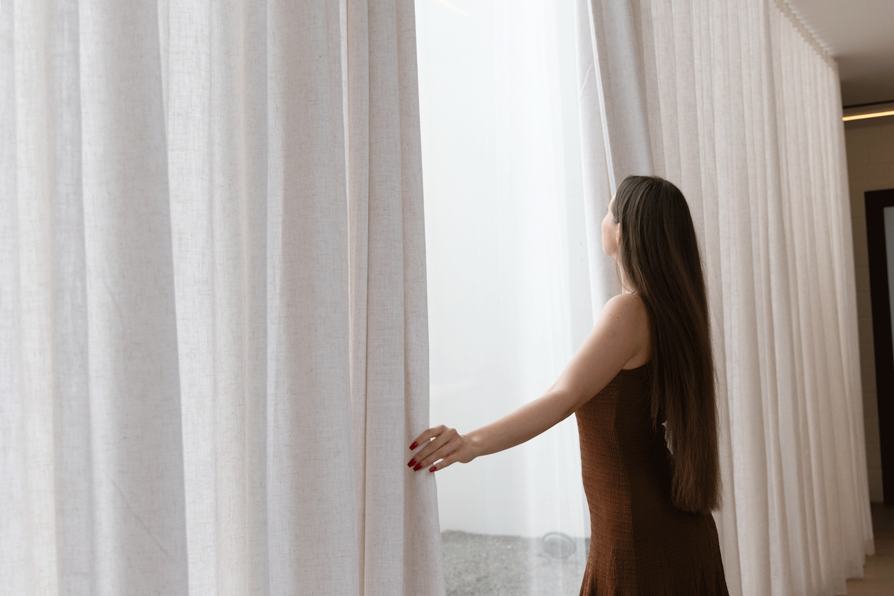 Floor-to-ceiling linen wave curtains